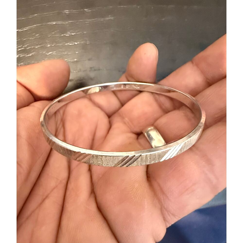 Vintage Signed Monet Silver Tone Etched Bangle Bracelet 7.5“